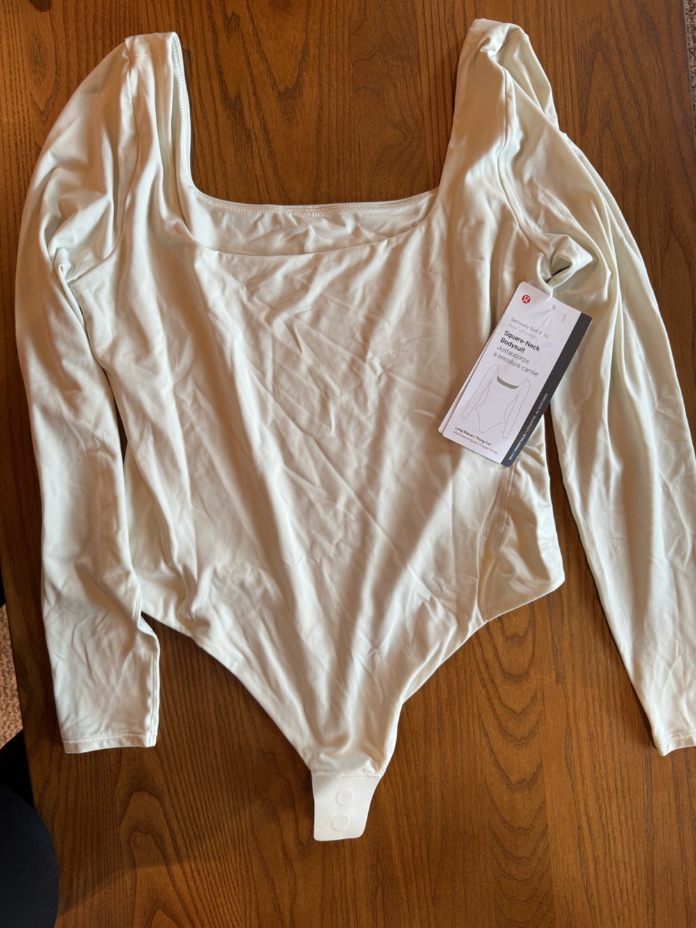 lululemon athletica Long Sleeve Scoop Neck Bodysuit in Off-White/Cream